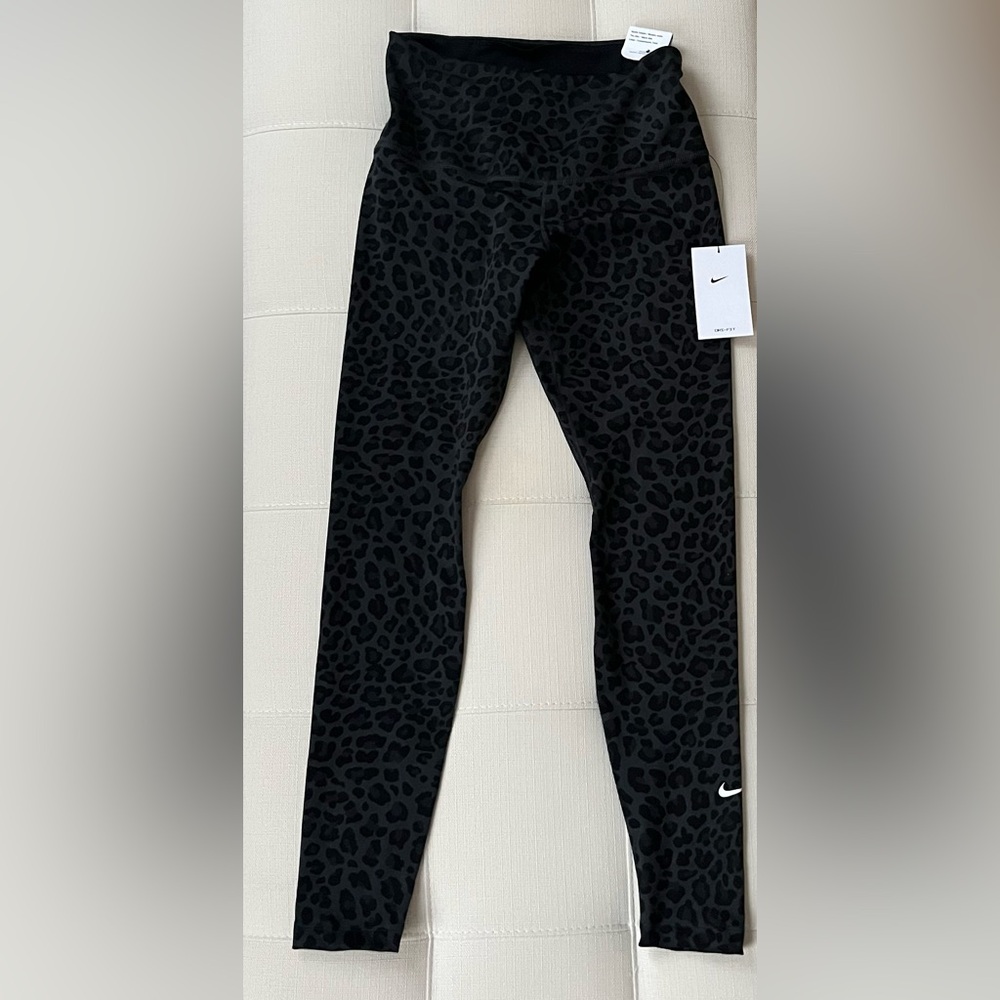 Black and gray leopard print Nike workout pants